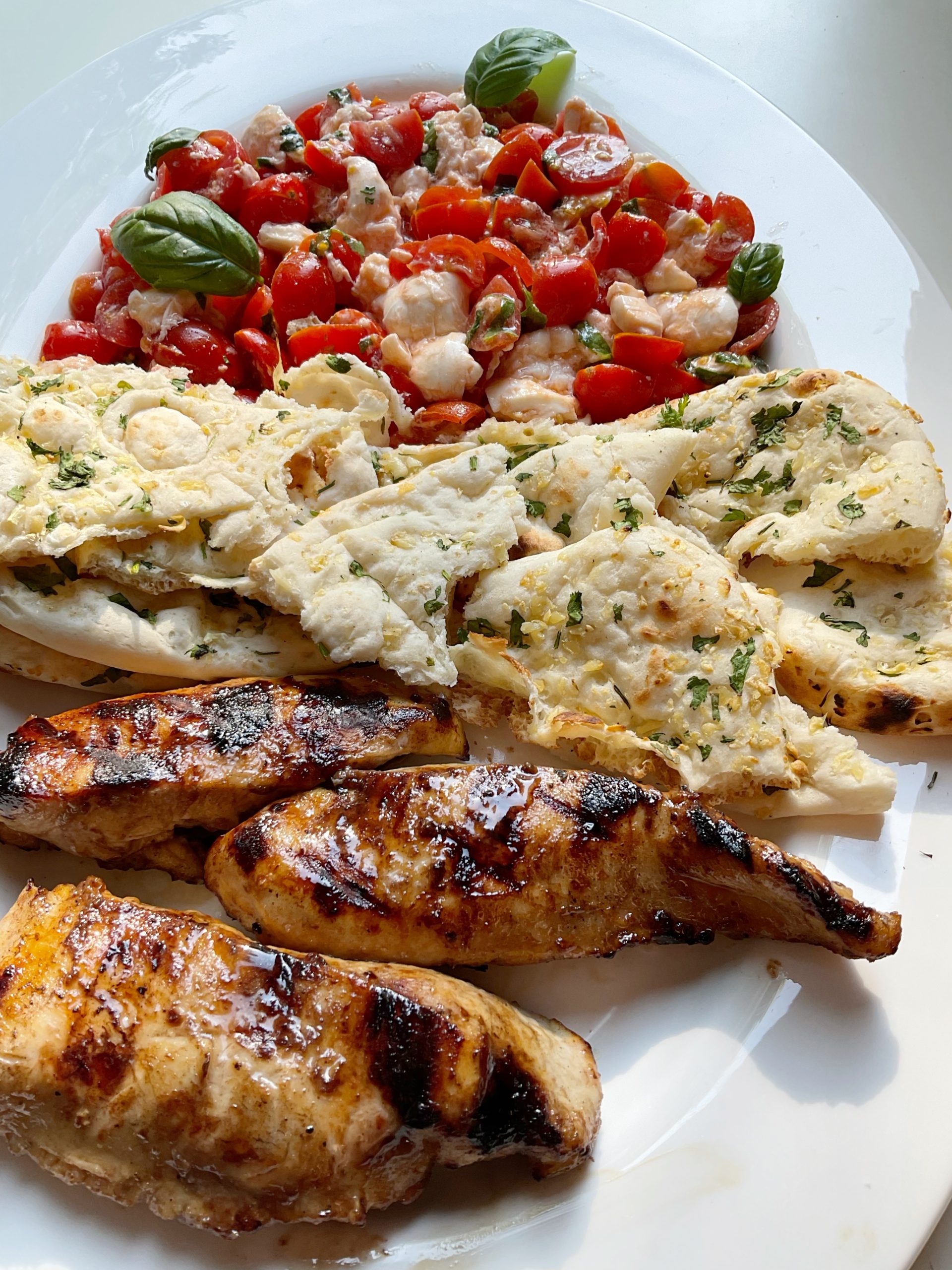 CAPRESE AND GRILLED BALSAMIC CHICKEN WITH GARLIC NAAN